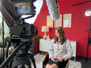 Woman talking to camera during a brand video interview