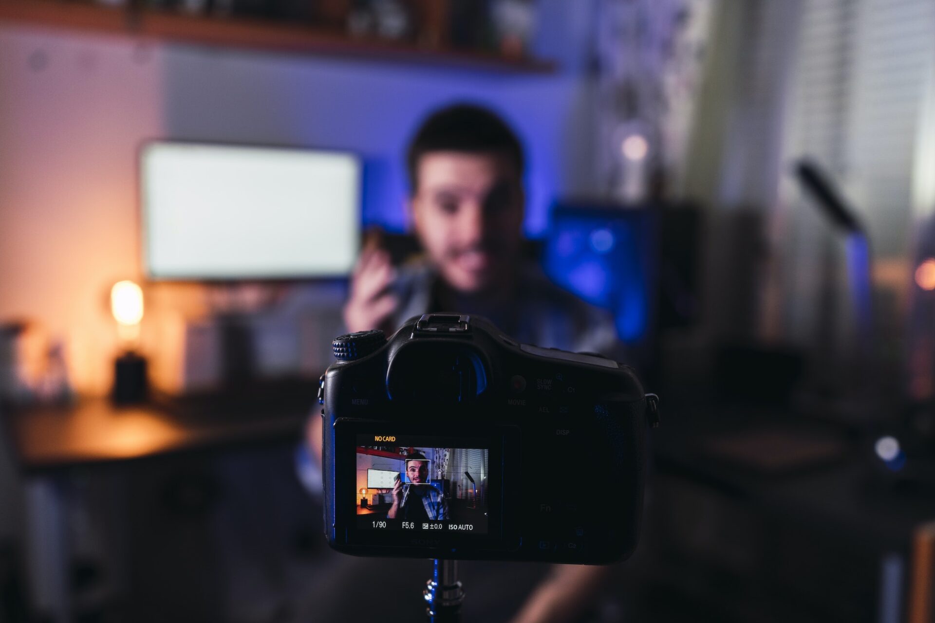 Small business owner recording a video about their business at home